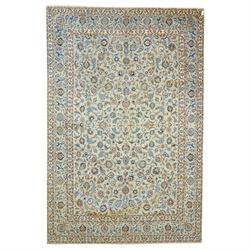 Central Persian Kashan hand-knotted carpet, pale blue field decorated with an all-over scr...