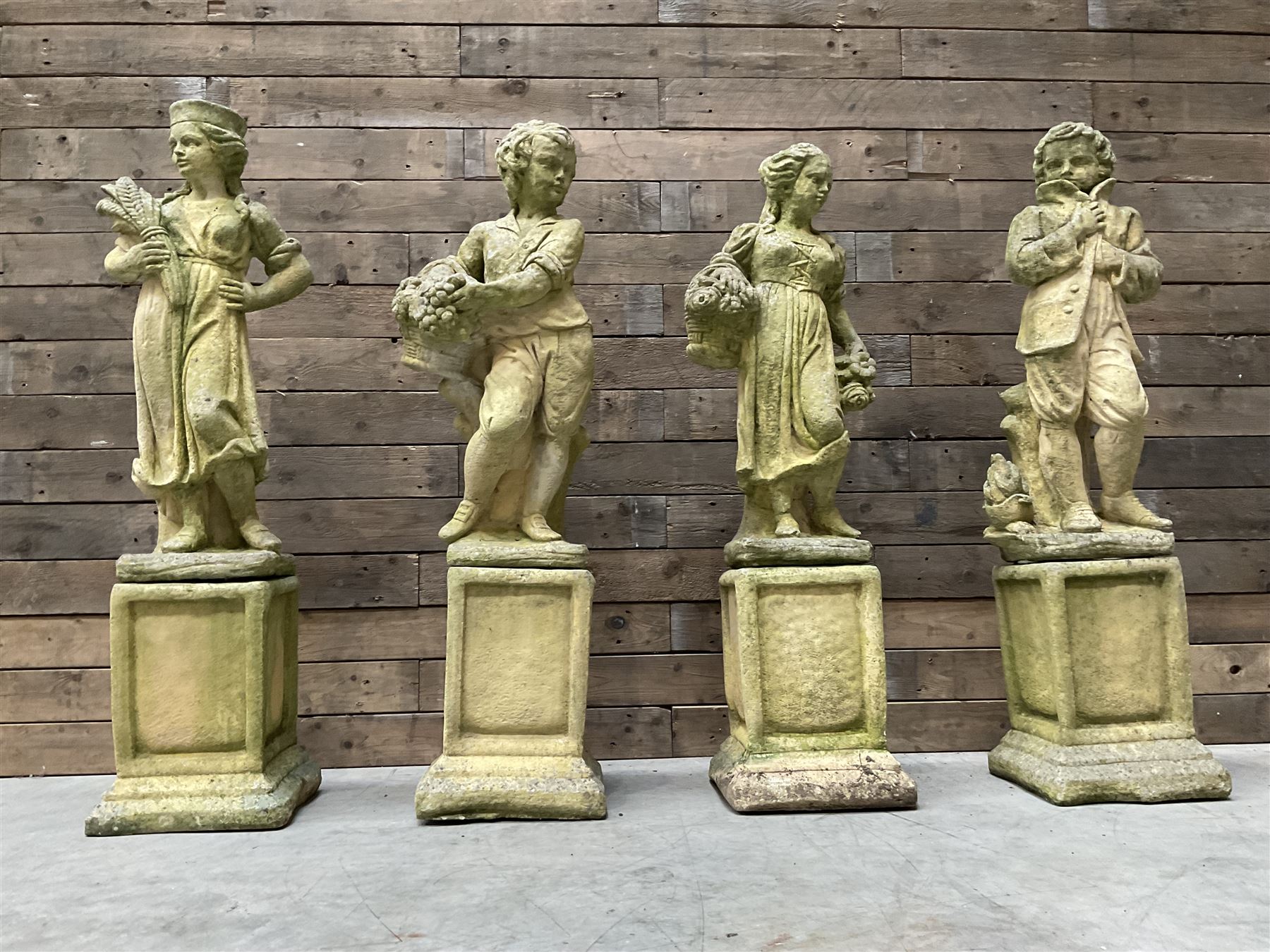 The Four Seasons - set of four cast stone garden figures on plinths