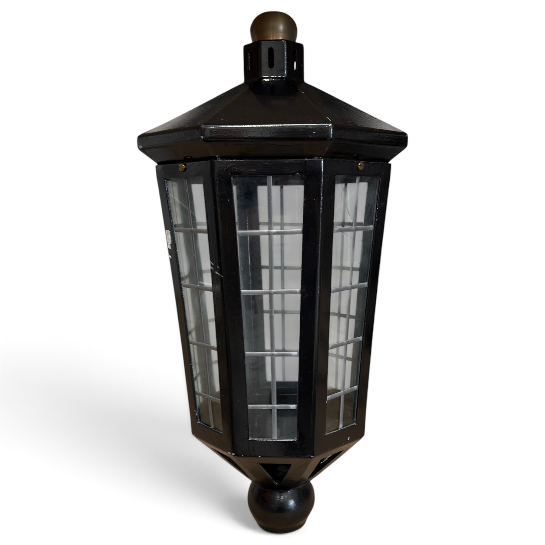 Georgian design black-painted metal octagonal hanging lantern, with brass ball finial above a hipped canopy, astragal glazed lattice panels and pendant ball terminal