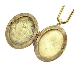 9ct gold locket pendant, hallmarked, on 18ct gold palma link necklace chain, stamped 750