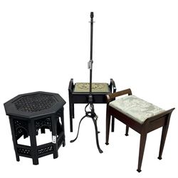 Anglo-Indian octagonal centre table with pierced decoration (D60cm); wrought metal standard lamp (H135cm); and two piano stools