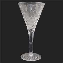 Stuart crystal 'Beaconsfield' pattern drinking glasses comprising twelve wine glasses and four champagne flutes (16)