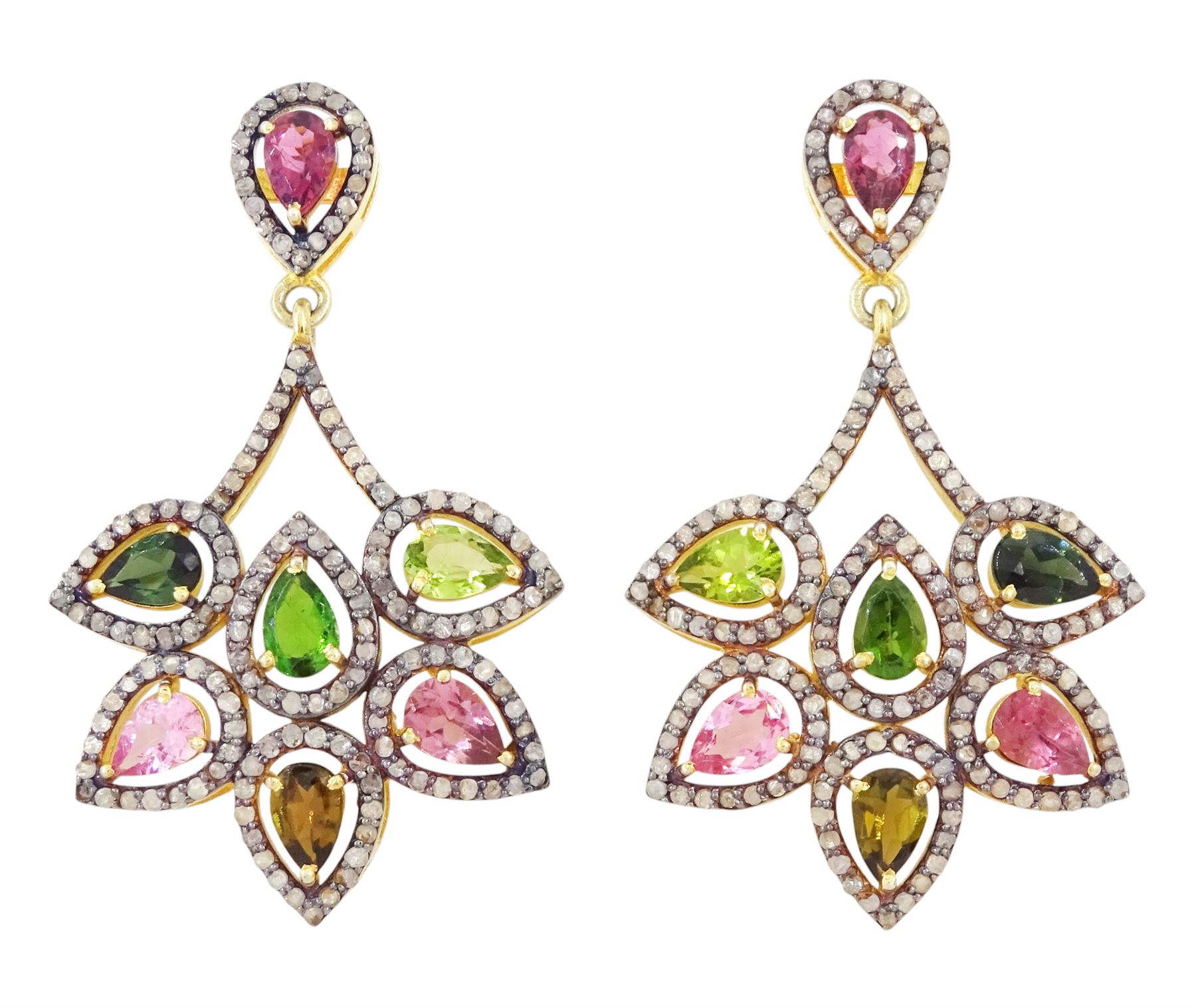 Pair of silver and silver-gilt tourmaline and diamond earrings, each stud set with seven pear cut tourmalines including green and pink, each surrounded by rose cut diamonds, total tourmaline weight approx 4.50 carat, total diamond weight approx 1.80 carat