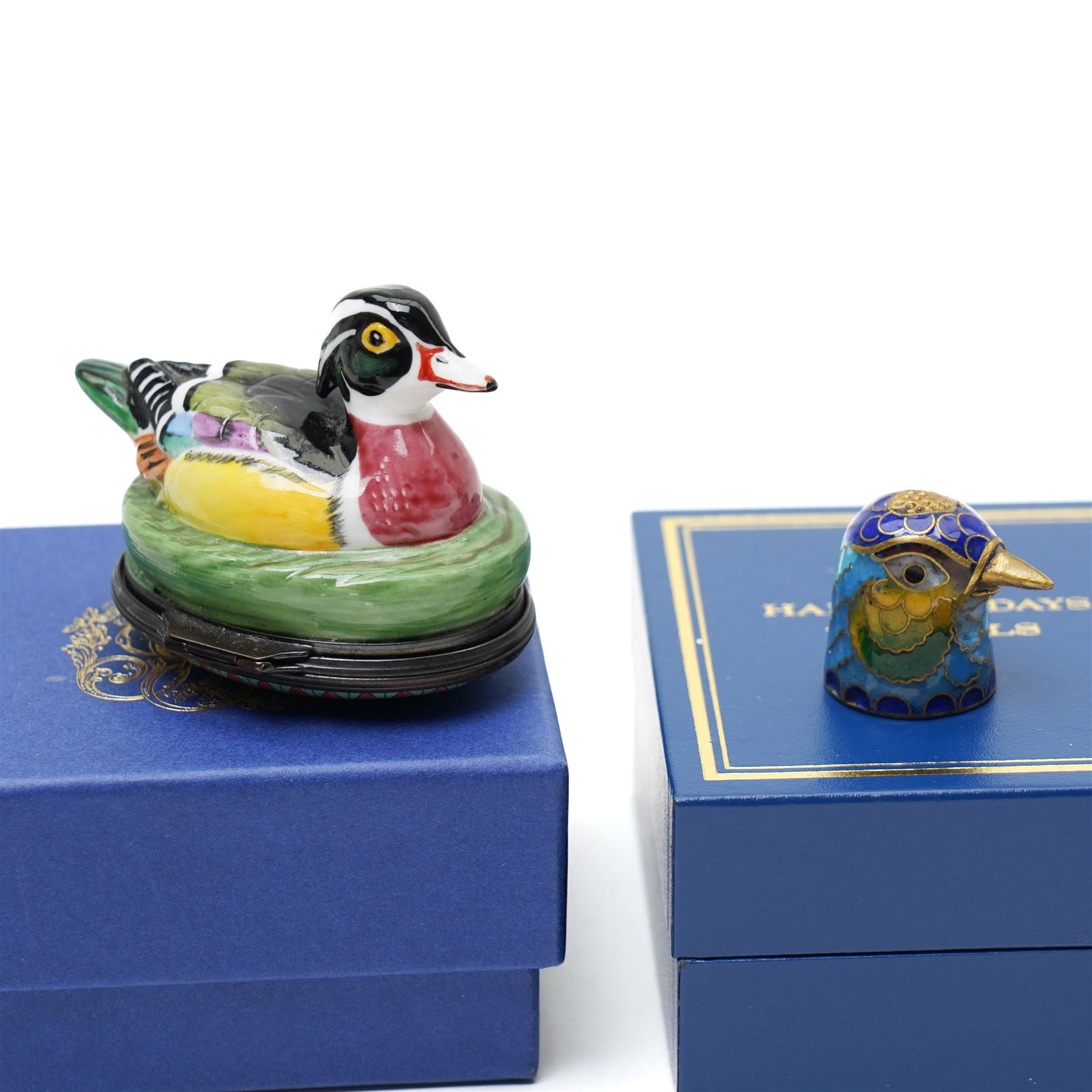 Five Crummles & Co Beatrix Potter enamel boxes, Thomas Goode Royal House of Windsor limited edition enamel box 83/500, boxed, Halcyon enamel box in the shape of a duck and five other enamel boxes (12)
