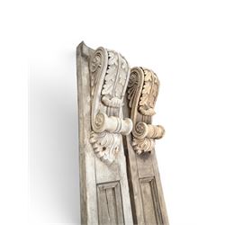 Pair of 19th century pine architectural pilasters, with painted terracotta capitols, with acanthus and scroll detail (18cm x 15cm x 57cm)
