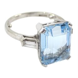 18ct white gold emerald cut aquamarine ring, the aquamarine measuring approx 13mm x 10.3mm x depth of approx 6mm, with baguette diamond shoulders, hallmarked