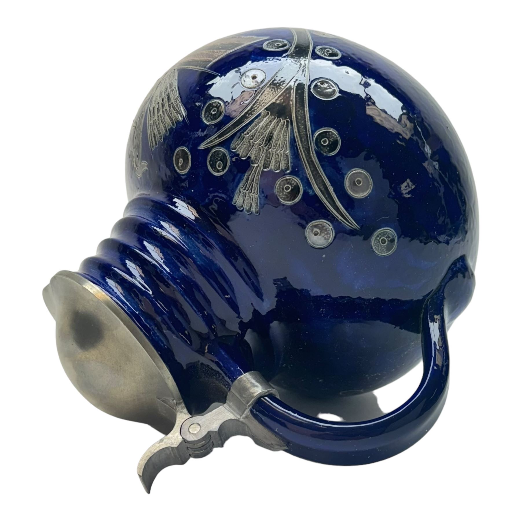 Wim Muhlendyck (1905-1986),  saltglaze stoneware jug of globular form with pulled and applied handle and ribbed neck with white cover, with stylised cockerels and flowers on a dark blue ground, with makers mark beneath, H22cm