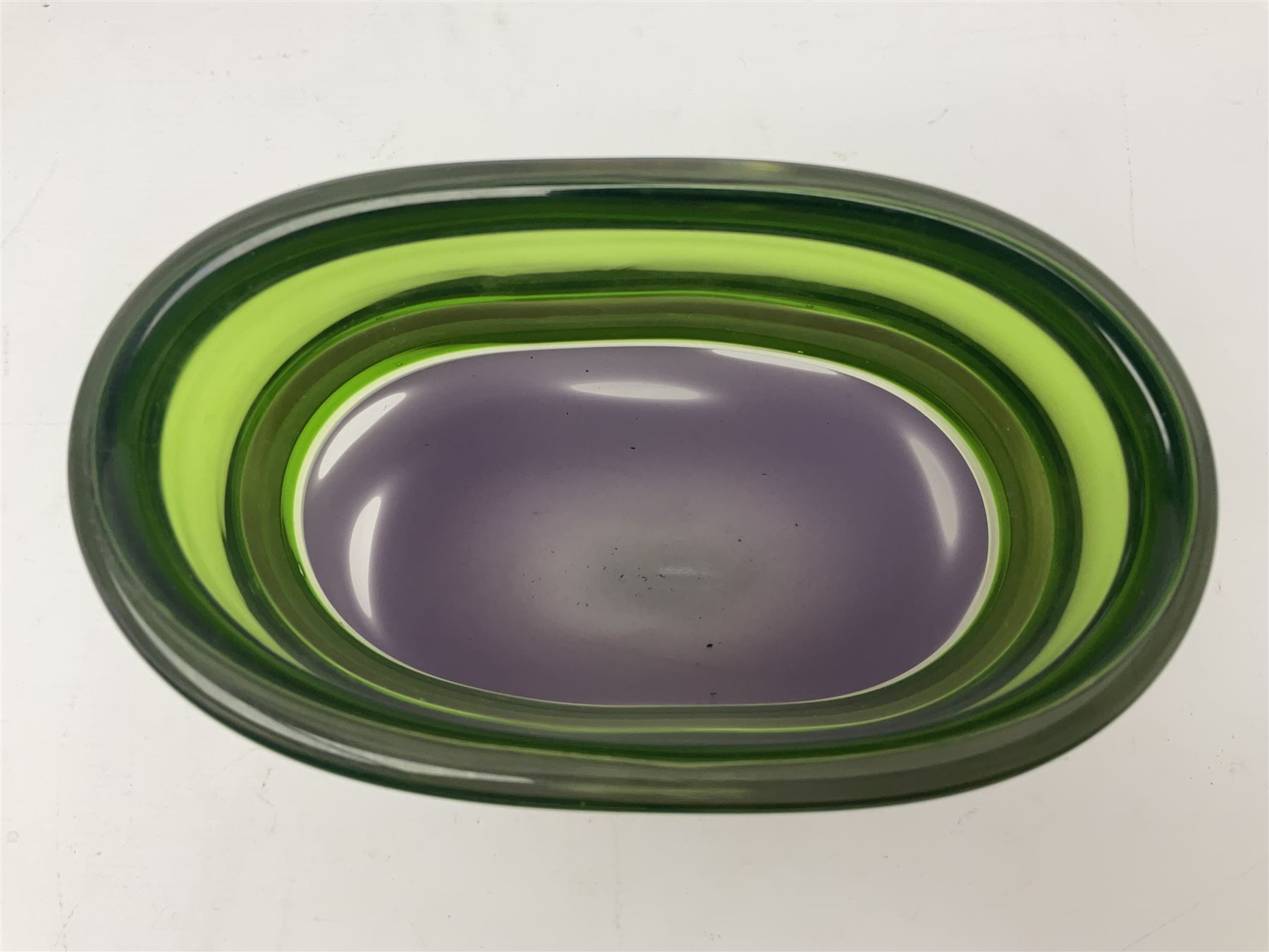 Stuart Akroyd glass vase, green banded top and opaque purple lower section with bubble inclusions, with sticker and engraved signature beneath, H25cm