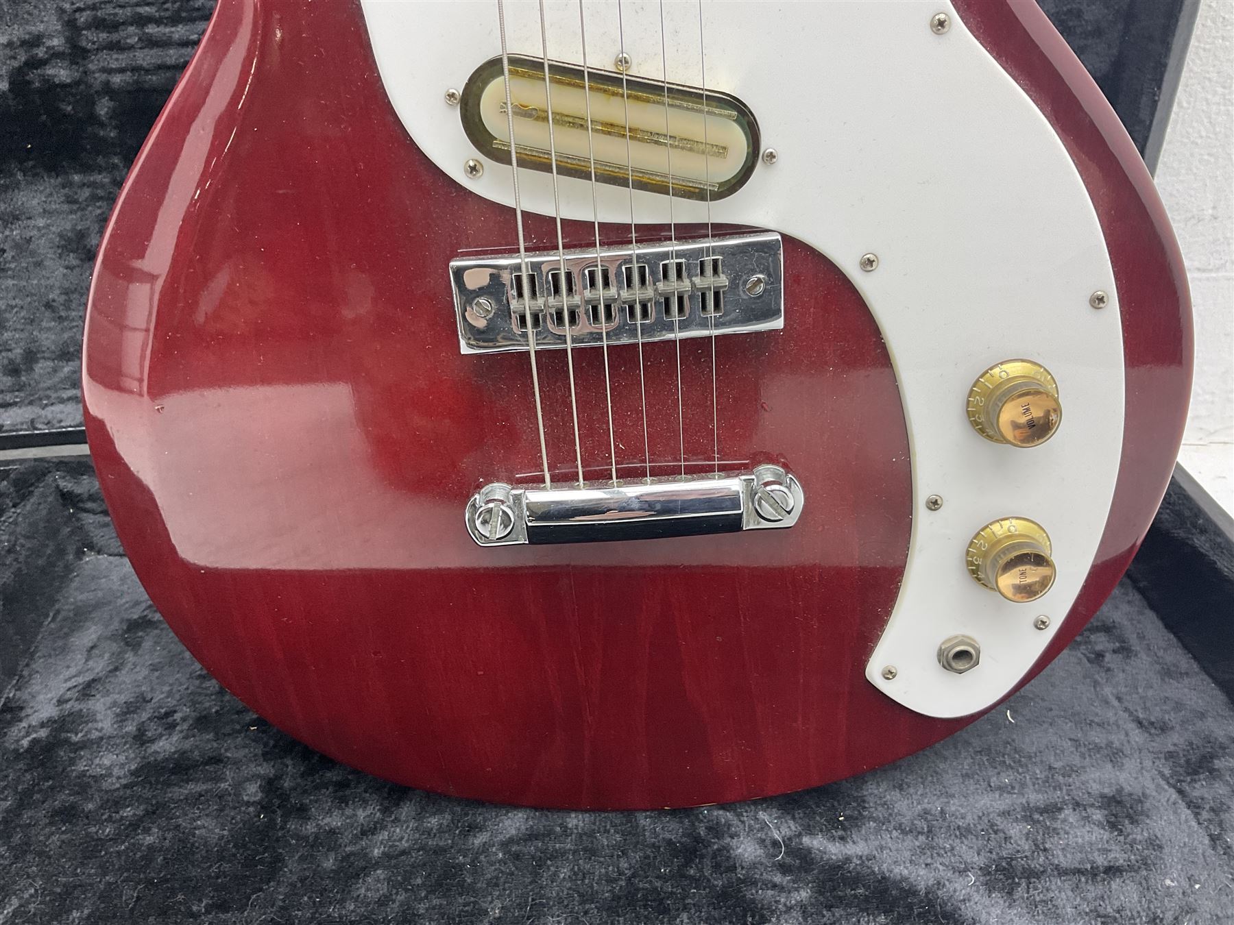 Gibson Marauder style six-string electric guitar with cherry coloured body, marked made in Japan L101cm; in locking hard carry case