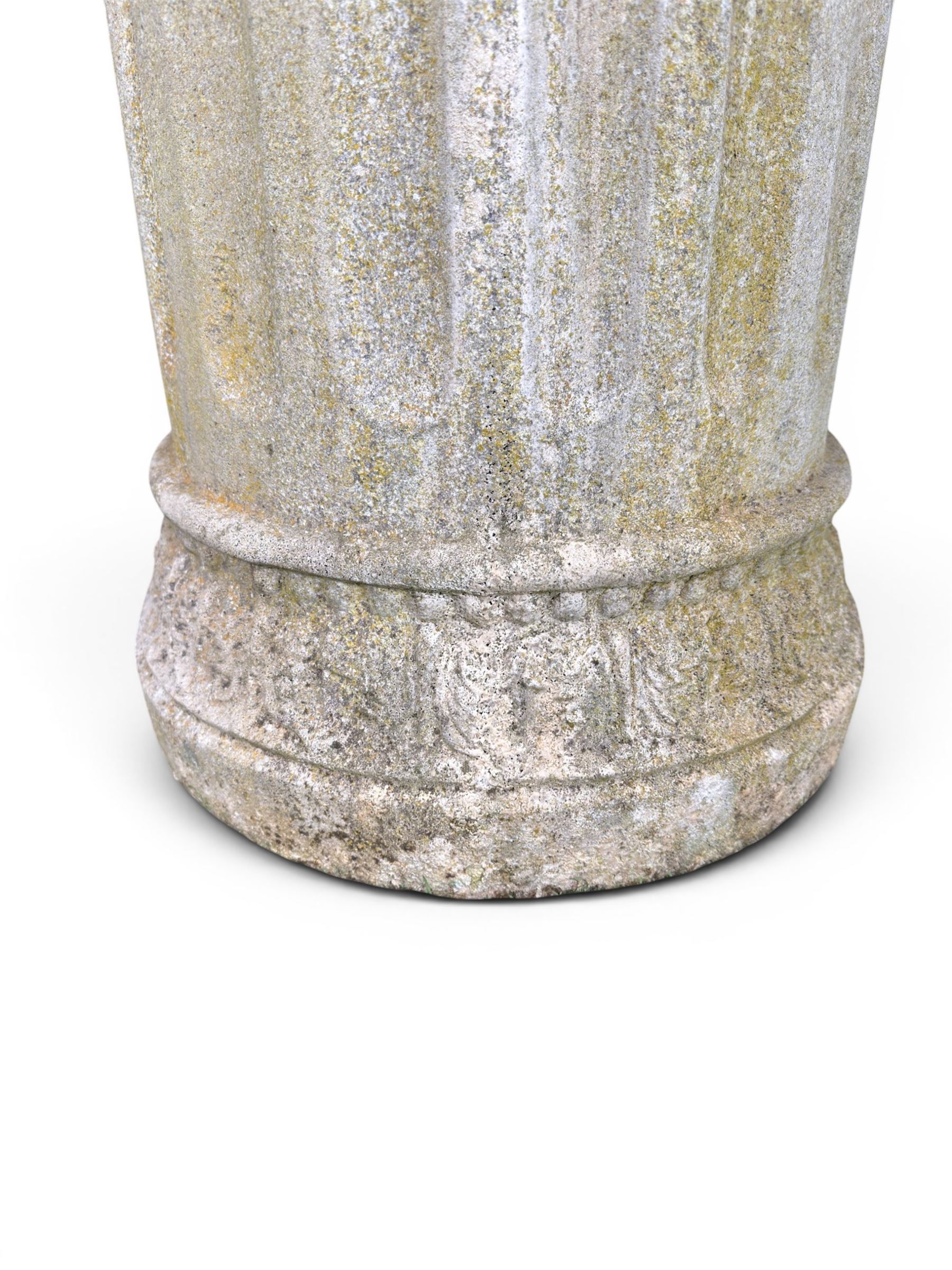 Four 20th century good quality weathered cast stone pedestal urns, circular lobed bowls with rope twist and lattice border, raised on squat base with fluted columns
