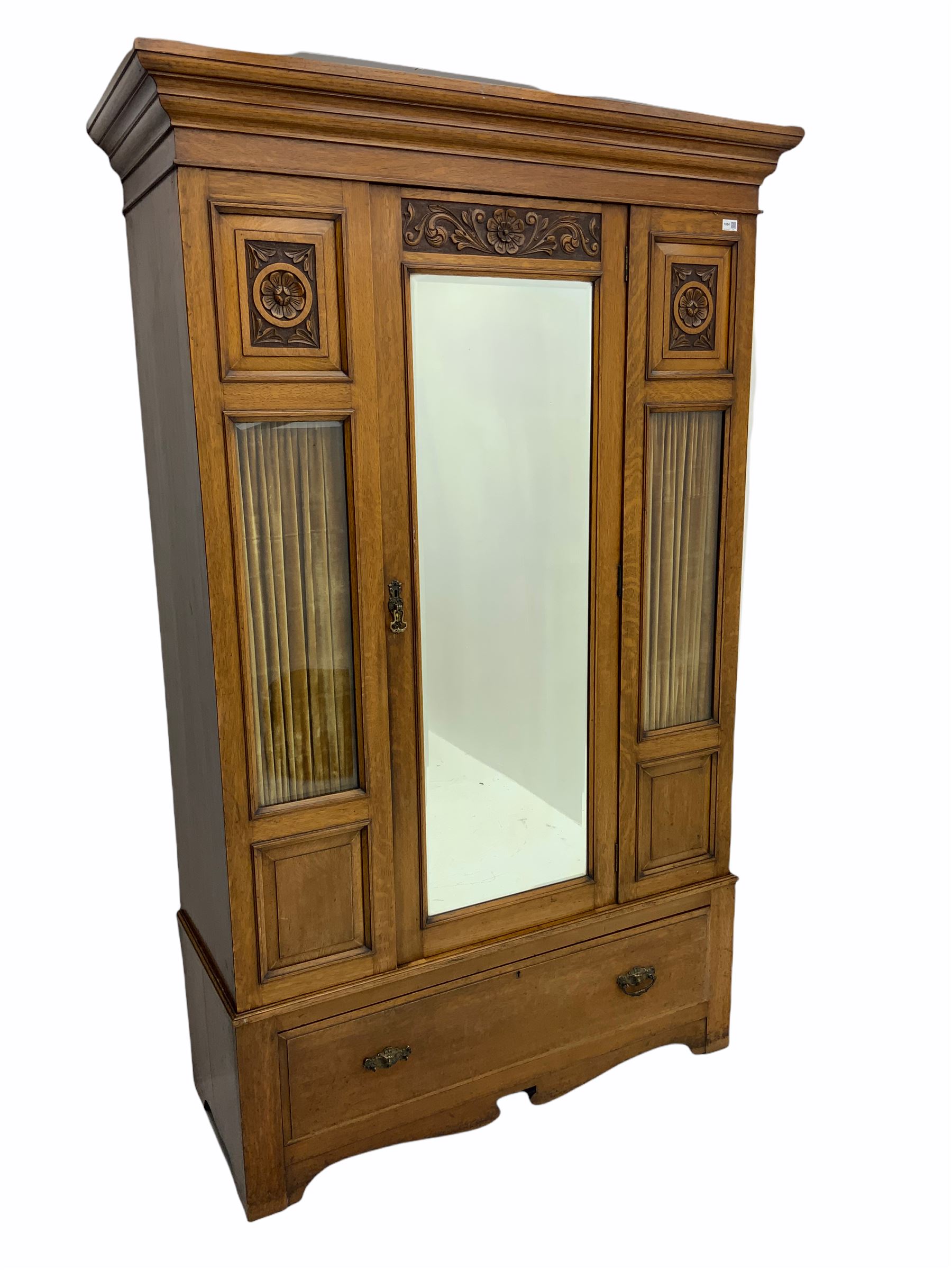 Edwardian oak wardrobe, single mirror door, glazed panels with decorative curtains behind, single drawer to base