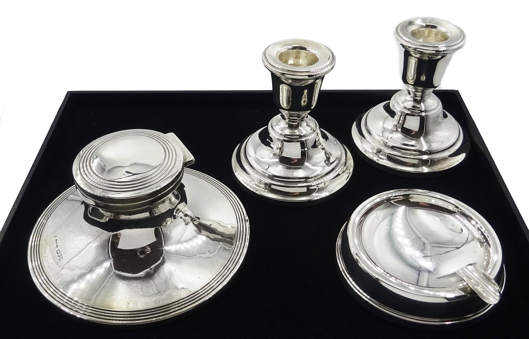 Pair of silver dwarf candlesticks by Sanders & Mackenzie Birmingham