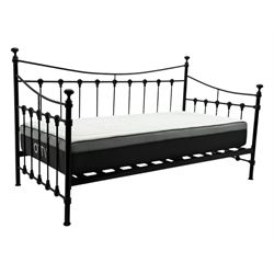Contemporary Victorian revival black metal day bed, featuring arched back and sides with turned finials and spindle rails, complete with single 'OTTO' mattress
