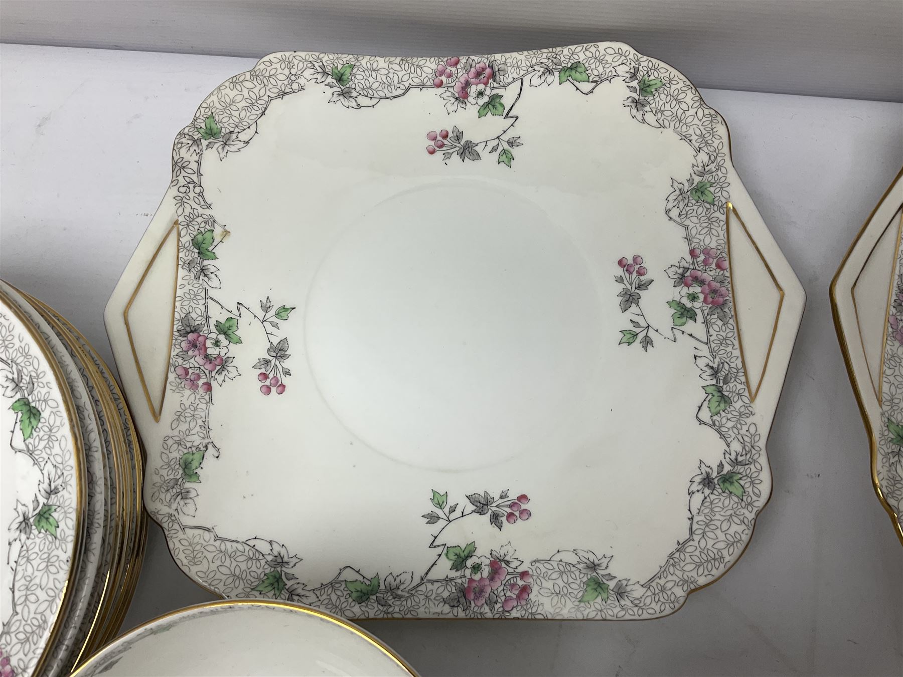 Shelley Bramble Rose pattern tea service, comprising milk jug, open sucrier, ten cups and twelve saucers, twelve dessert plates and two cake plates (38)