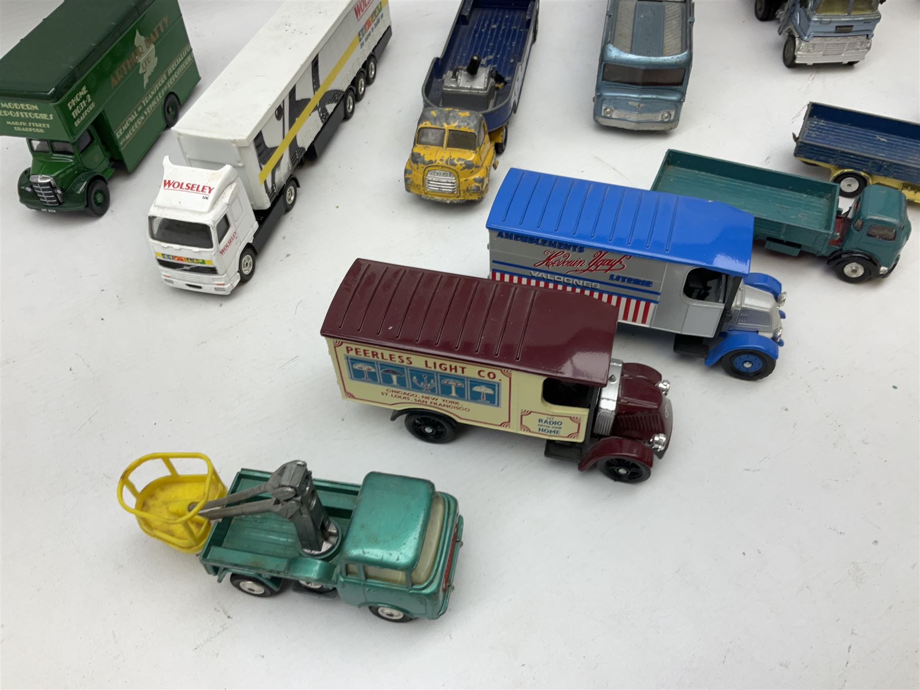 Corgi - eighteen unboxed and playworn/repainted die-cast commercial vehicles including Commer 5-Ton Wagon with drop-side trailer and two other 5-Ton wagons, Dodge Key Fargo, Jeep FC-150, two London Routemaster buses, Carrimore Trideck Transporter, two Carrimore Mark IV Transporters, Carrimore Low Loader, Ecurie Ecosse Racing Car Transporter etc (18)