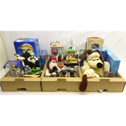  Quantity of Wallace & Gromit toys, ornaments and collectibles including hot water bottle cover, 'Going Crackers' game, garden ornaments, mugs, talking garden ornament, boxed photo frames etc, in three boxes  