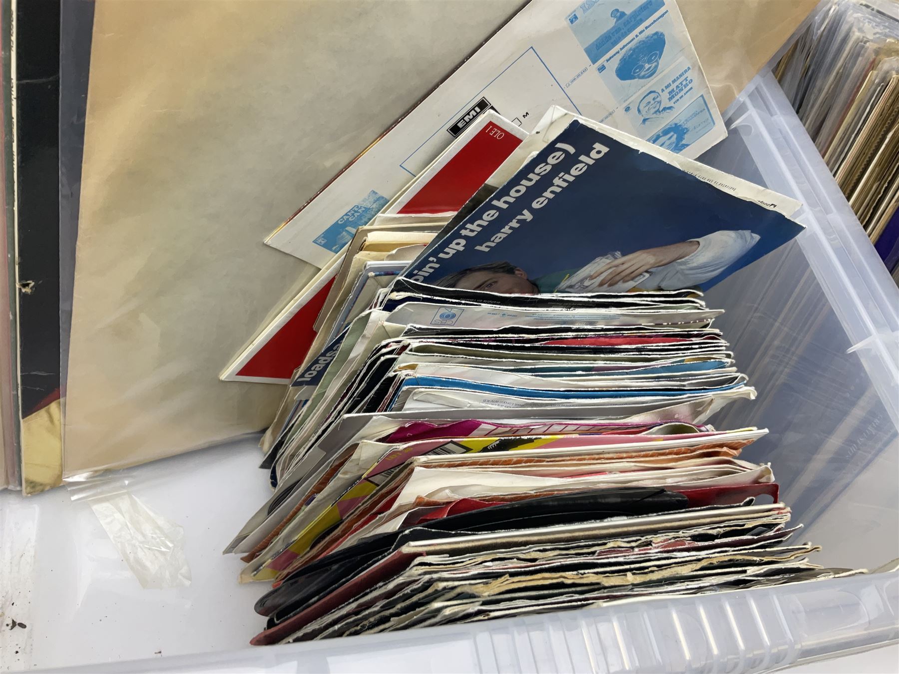 Large quantity of vinyl LPs, predominantly rock and pop, to include Elvis, Elton John, The Kinks, Deep Purple, Eurythmics, Whitney Houston, Phil Collins, Rolling Stones etc, in three boxes, together with quantity of 45 rpm records, Steepletone SRP1R-11 record player and record carry case