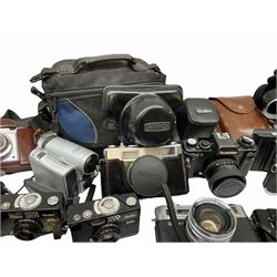 Collection of cameras, to include three Olympus Trip 35,  Balda Super Baldax, Seagull 4A TLR Camera, Pentax MG, Pentax-MV1, Yashica, two Yashica Electro 35, Rollei B35, Fujica 35 EE etc. 