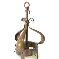 Arts & Crafts brass ceiling lantern with a trio of fluer-de-lis mounted arms, the vaseline glass pendant light shade of cylindrical form with flared rim, H52cm