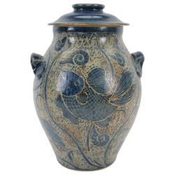 John Egerton (c1945-): studio pottery stoneware vase and cover, decorated with fish and ammonites upon a blue ground, H38cm