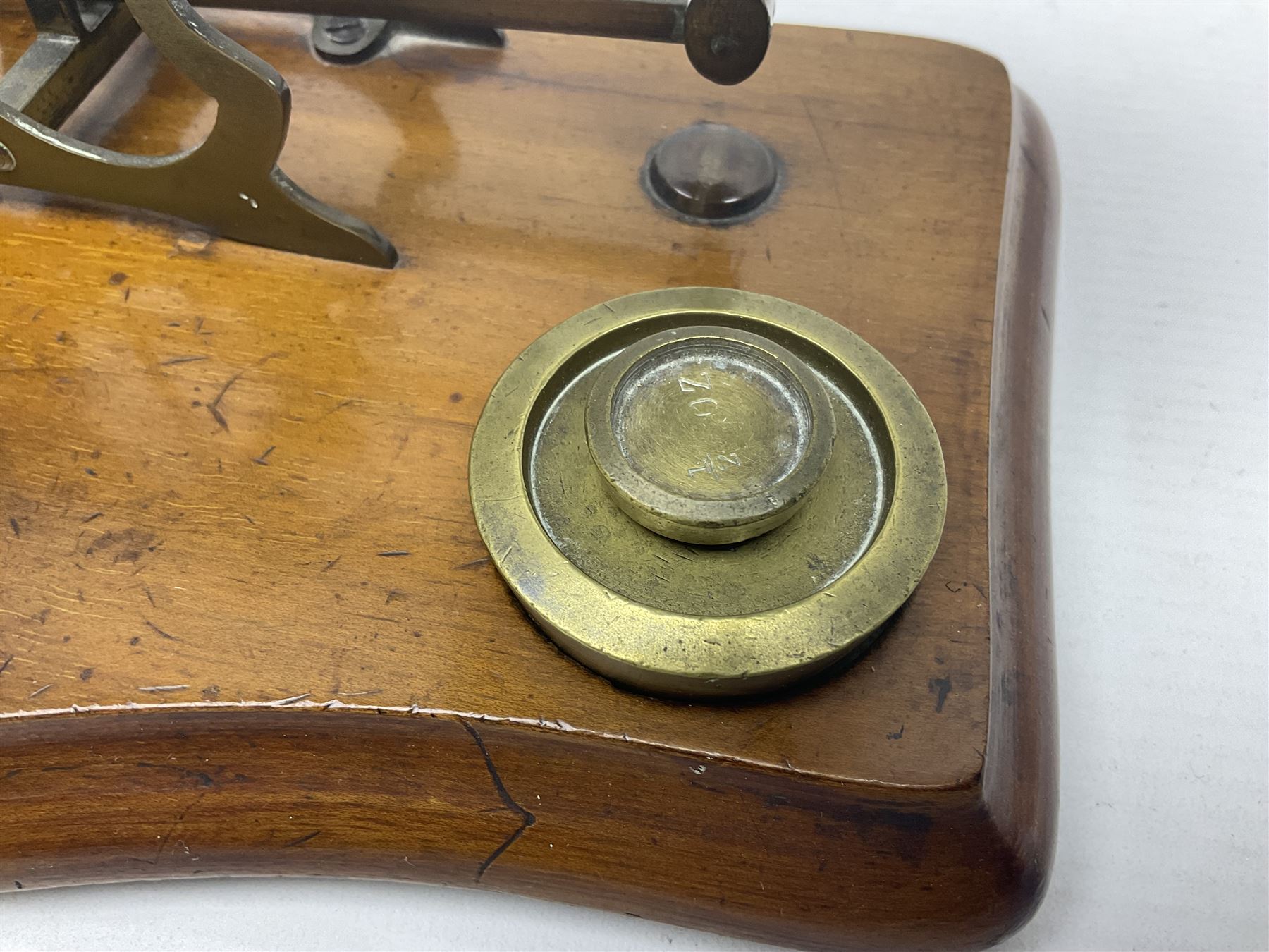 Set of brass postal scales, on wooden base