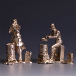 Two silver place card holders from the 'Cries of London' series, each depicting traditiona...