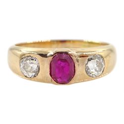 Early 20th century Austrian 14ct gold, gypsy set three stone oval ruby and old round cut diamond ring, hallmarked, total diamond weight approx 0.60 carat