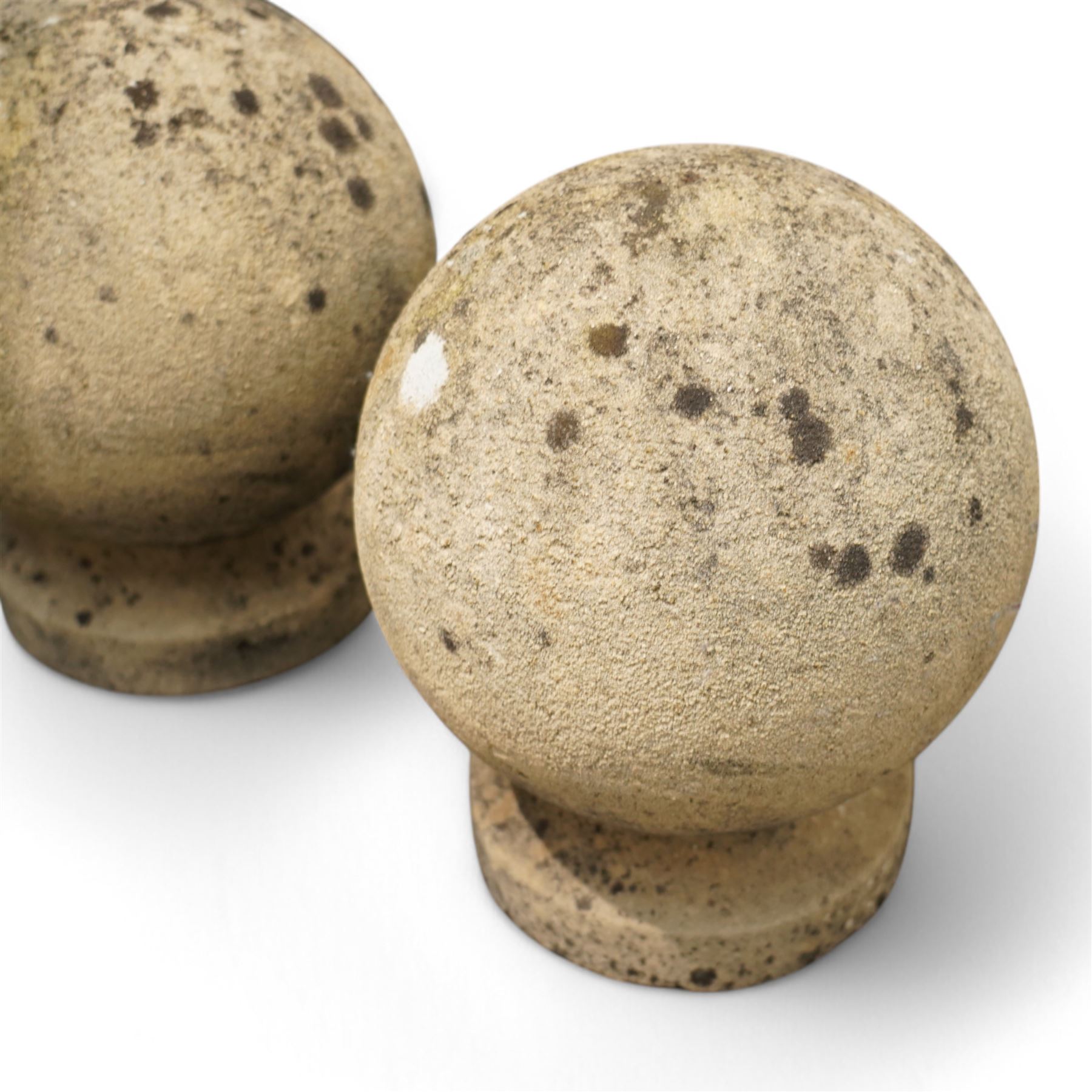 Pair of cast stone spherical ball garden finials or gate post tops