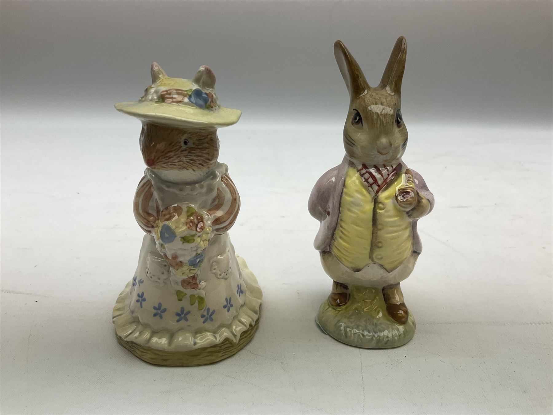 Two Royal Doulton Brambly Hedge figures comprising ‘Mrs Saltapple’ and ‘Poppy Eyebright’, Royal Albert Beatrix Potter ‘Foxy Whiskered Gentleman’ and ‘Mr Benjamin Bunny’, all with boxes, two Border Fine Arts Beatrix Potter figures comprising ‘Mrs Tiggywingle’ and ‘Mrs Rabbit’, Royal Doulton ‘Spike and Tyke’ and ‘Winnie Pooh and Footprints’ both with boxes, all marked beneath