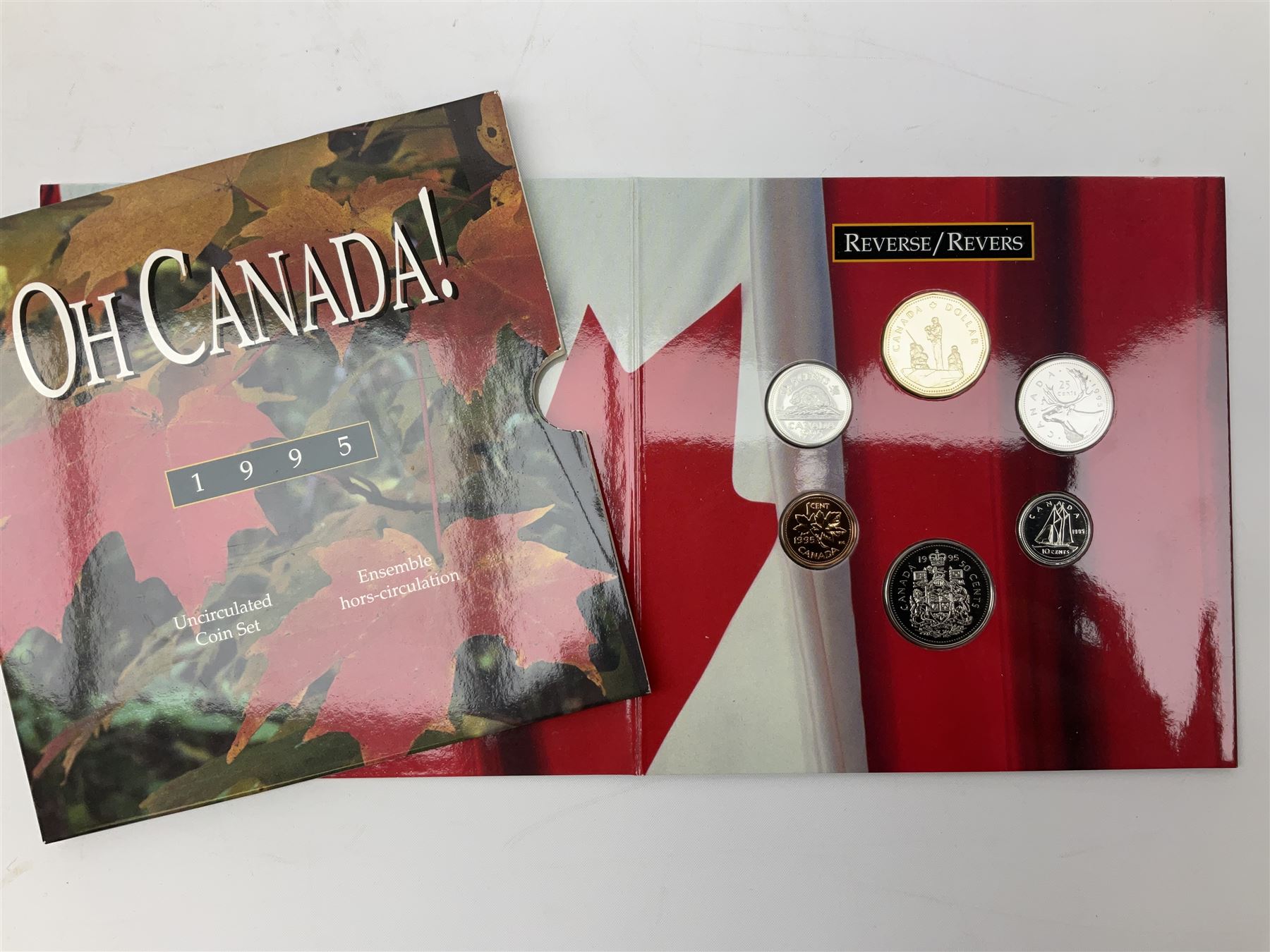 Canadian coinage including Queen Elizabeth II 1964 and four 1966 dollars, 1975 Olympic four coin set comprising two five dollar and two ten dollar coins, 1995 specimen coin set in blue folder, 1995 uncirculated coin set etc 