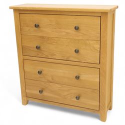 Modern oak effect shoe cabinet, plain rectangular top over two fall-front drawers with metal drop handles, framed sides and block supports