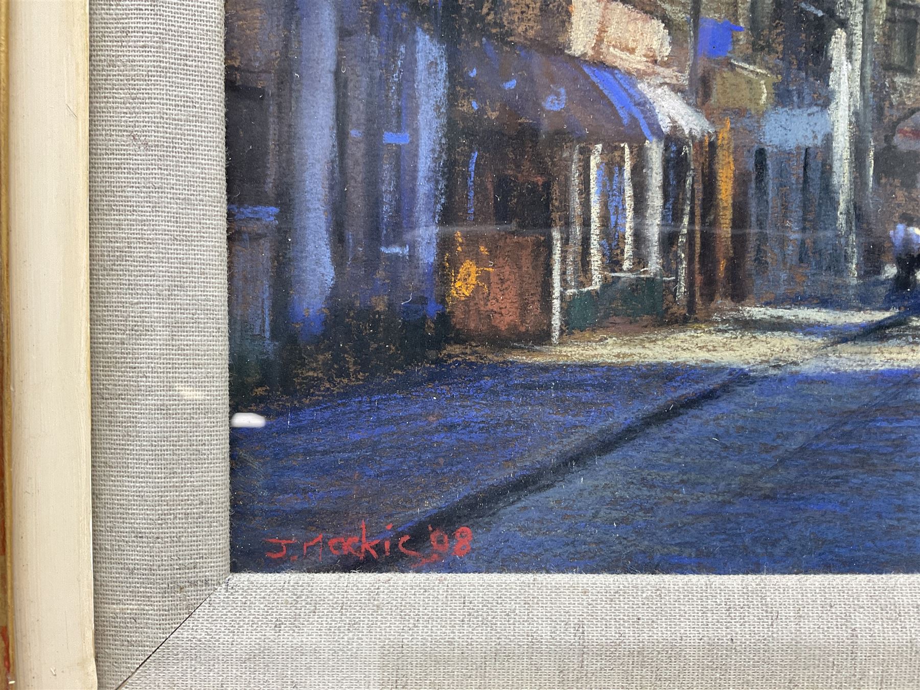 John Mackie (Scottish 1953-): Blue Skies Street Scene, pastel signed and dated '08, 24cm x 34cm