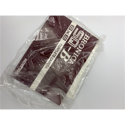 'Zenza Bronica SQ-B' camera fitted with 'Zenza Bronica Zenzanon-PS 1:28 f=80mm' lens, 'Zenza Bronica Zenzanon-PS 1:4 f=150mm' lens and 'Zenza Bronica Zenzanon-S 1:35 f=50mm' lens, with an instruction booklet