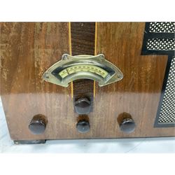 Two 1930s radios, comprising Art Deco Lotus valve example with copper fixtures, H50cm W37cm  together with a Swan Aerodyne example decorated with inlay