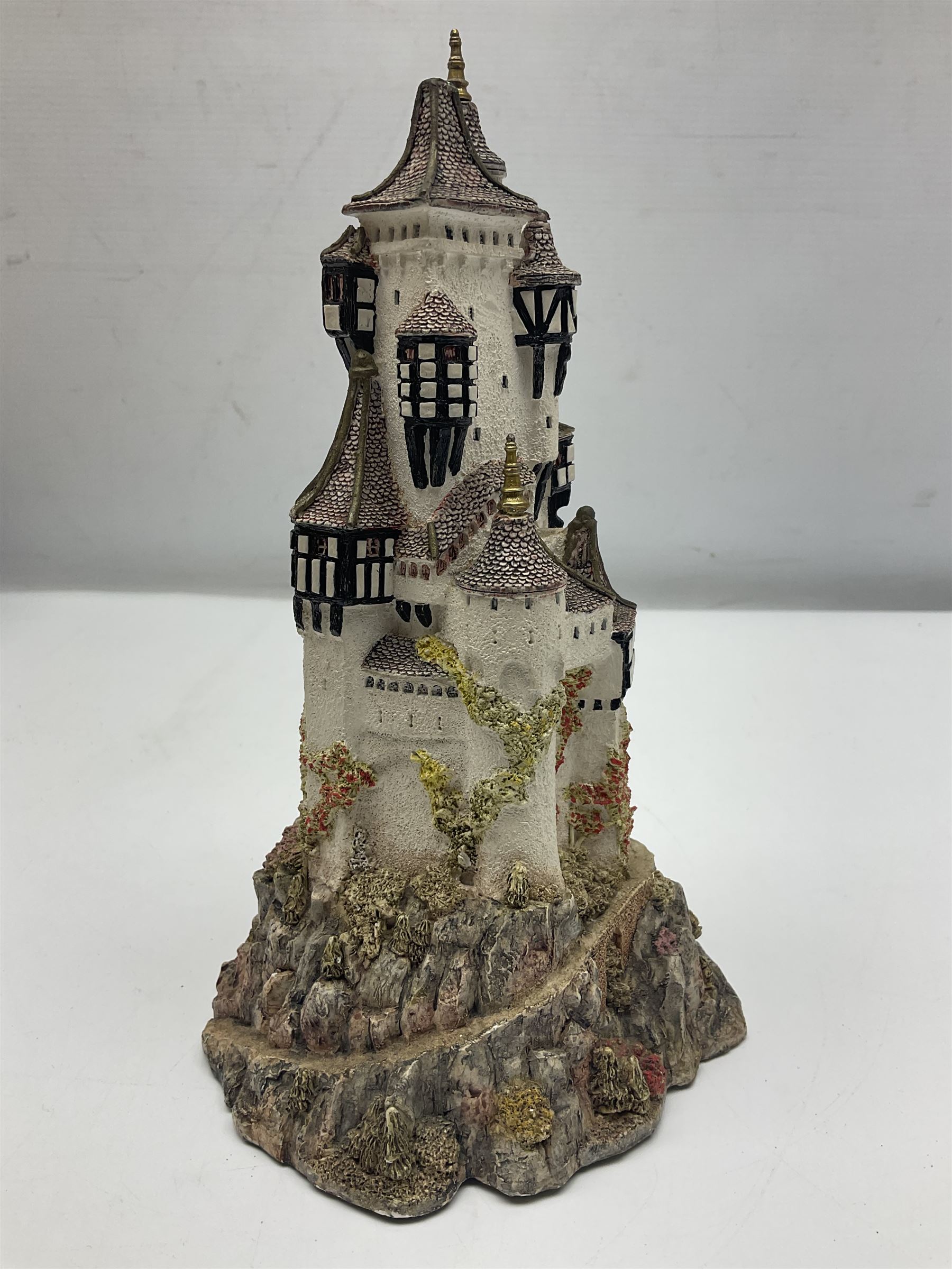 Five Lilliput Lanes, comprising Christmas at Woody Bay Station and Calling Home for Christmas both from the Illuminated collection, Castle of the Exiled Prince, Castle of The Ransomed King and Helvellyn, all with original boxes (5)