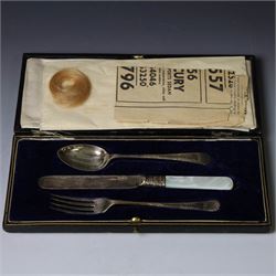 Silver Christening set, comprising spoon, fork and mother of pearl handled knife with engraved initials, together with a silver spoon and pusher set, all hallmarked, in fitted cases
