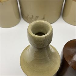 Large 2 gallon stoneware flagon, stamped 'John Soulby Wine Merchant Malton 2 Gall', together with a collection of similar stoneware jars and bottles, largest H40.5cm