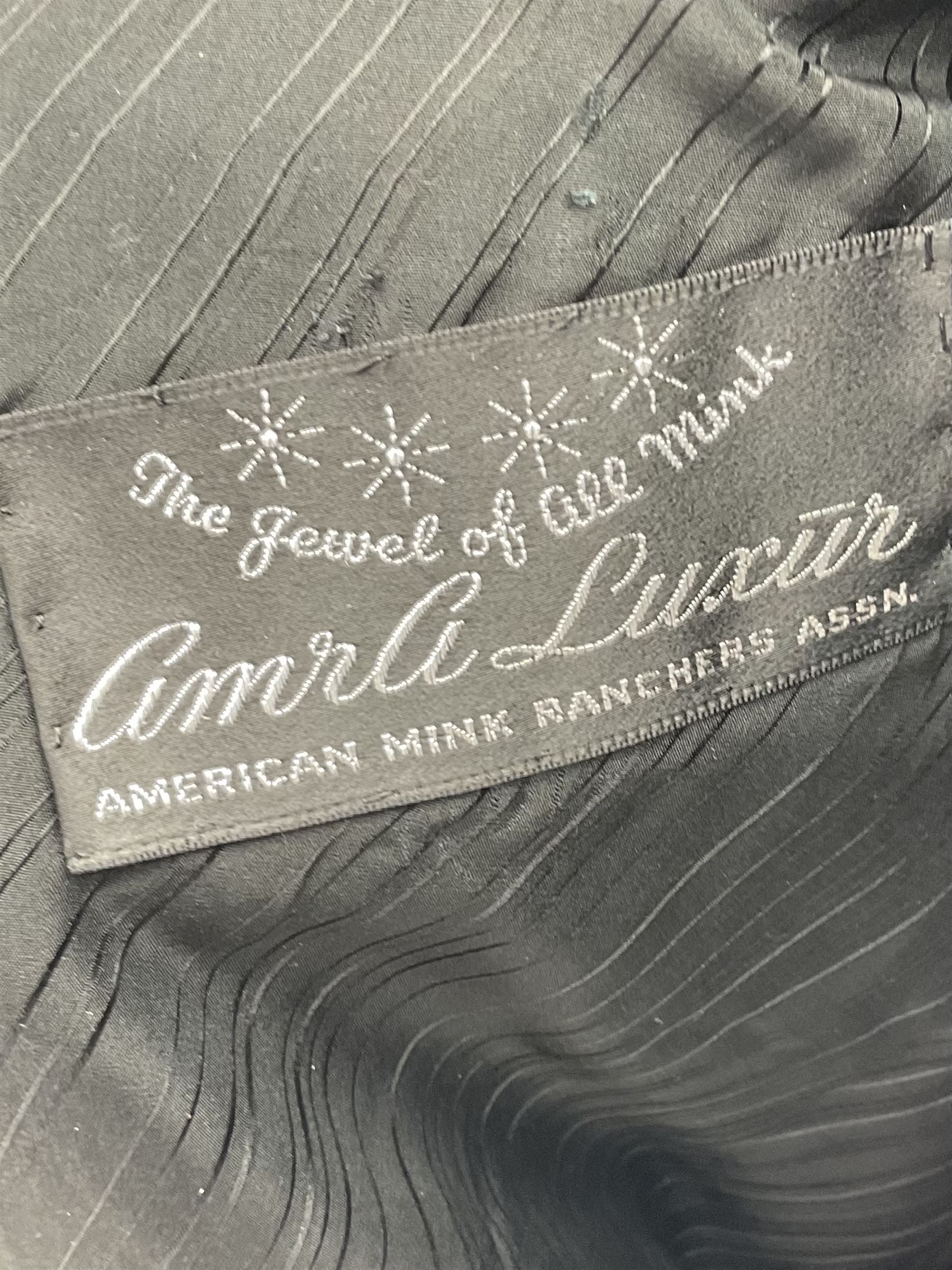 Modern cut lightweight skins lavender blue mink jacket, approx size 10 to 14, with elasticated cuffs, stand up small collar, black satin style lining, zip fastener, perfect condition as new, top class mink.
