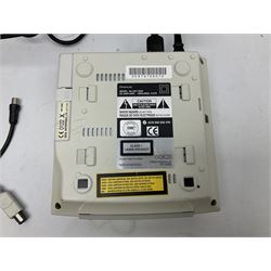 Dreamcast console, one controller, original instruction booklet with magazine and four games, ‘Aerowings’, ‘Buggy Heat’, ‘ Racing Simulation Monaco Grand Prix’ and ‘Who Wants to be a Millionaire’, all in original cases with instruction booklets 