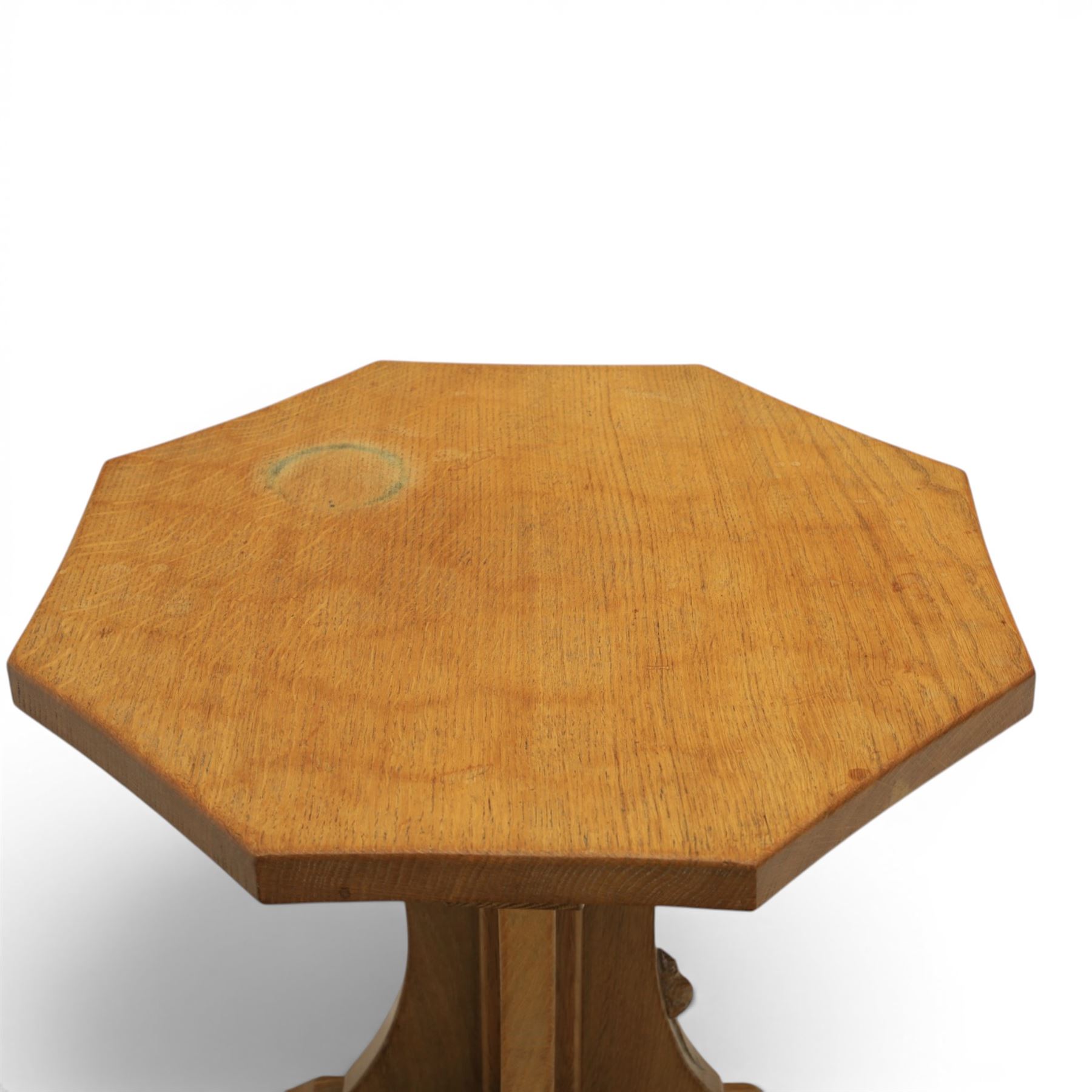 Mouseman - adzed oak octagonal occasional table,  raised on a quatriform base with carved mouse signature, by the workshop of Robert Thompson, Kilburn