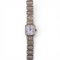 Marvin 9ct gold ladies quartz wristwatch, on integral 9ct gold bracelet, hallmarked