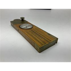 Late 19th/early 20th century boxwood and brass clinometer rule by Stanley, with inset magnetic compass, screw action protractor hinge divided to one degree with rise in inches per yard scale under, spirit level to one edge, marked 'W.F. Stanley Great Turnstile Holborn' with tables of distances, angles and thickness H16cm closed: in original leather covered case with instructions