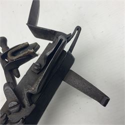 Late 18th/early 19th century flintlock tinder lighter, the steel box lock with hinged door to the left side, fruitwood butt with plain bar trigger, the left side set with a taper sconce and bipod front support, L21cm.