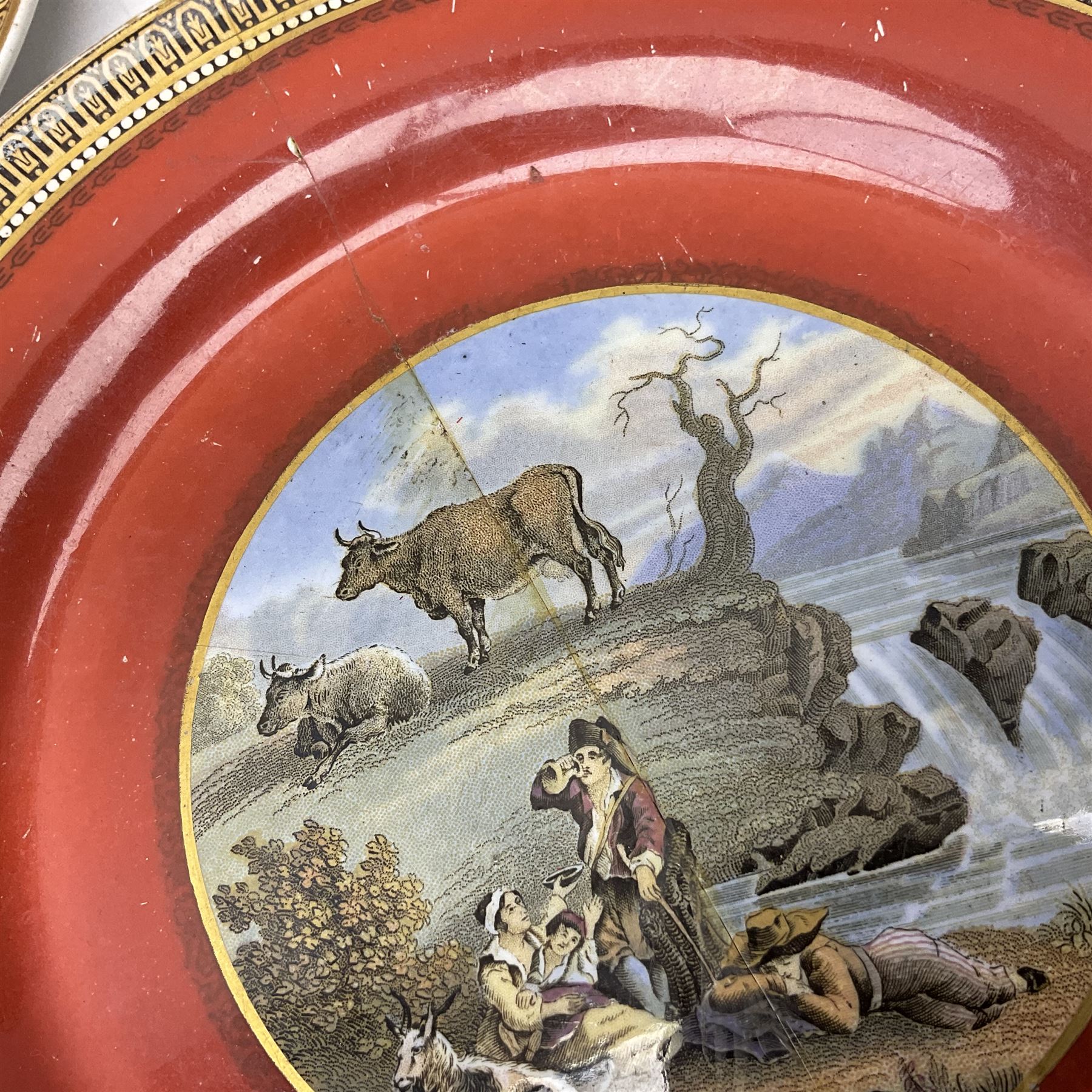 19th century Prattware table ware to include an oval footed dish decorated with a scene after Landseer 'Highland Music', retailed by James Muggleton L27.5cm, ‘The Truant’ plate after T. Webster, 'Blind Man's Buff' & 'Snap Dragon' tea plate, two side plates with malachite printed borders and others (17)