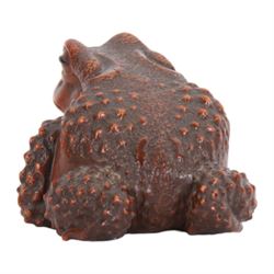 Japanese Edo Meiji period carved wooden netsuke, naturalistically modelled in the form of a seated toad with textured skin and black horn inlaid eyes, signed beneath for Masanao, Yamada, Ise Province, H5cm L7.5cm, 