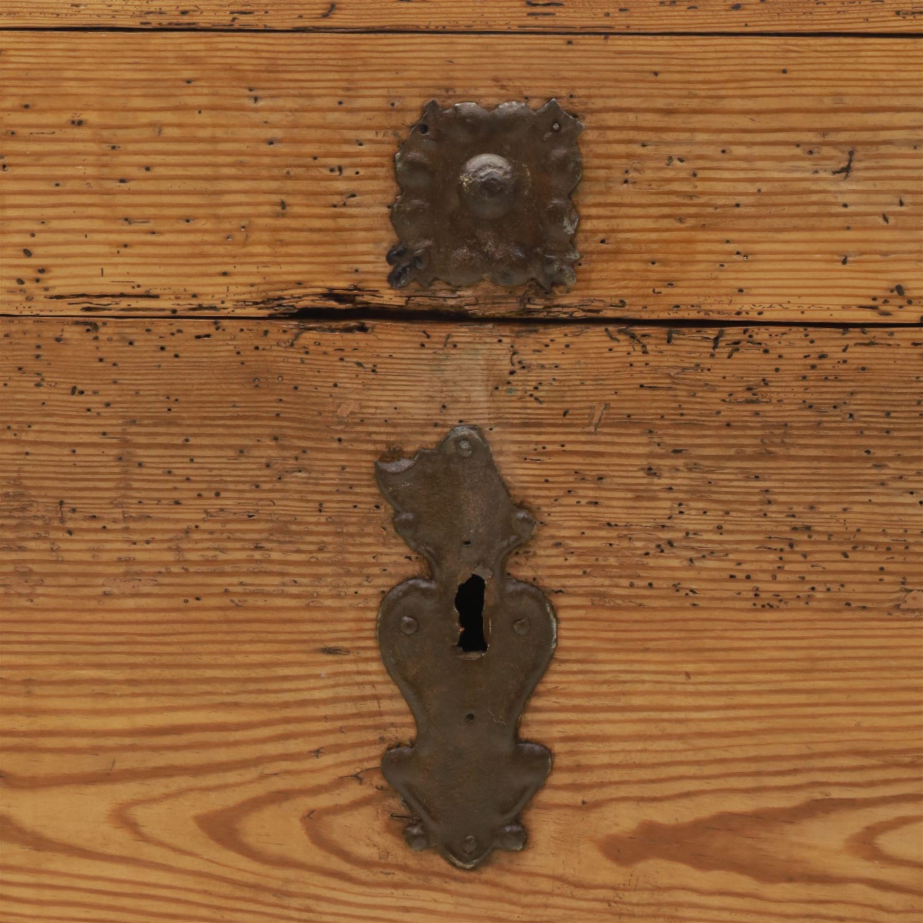 Early 20th century pine coffer, domed lid over plain front and sides with exposed dovetail joints, iron hasp and staple to front