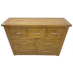 Light oak chest, fitted with seven drawers