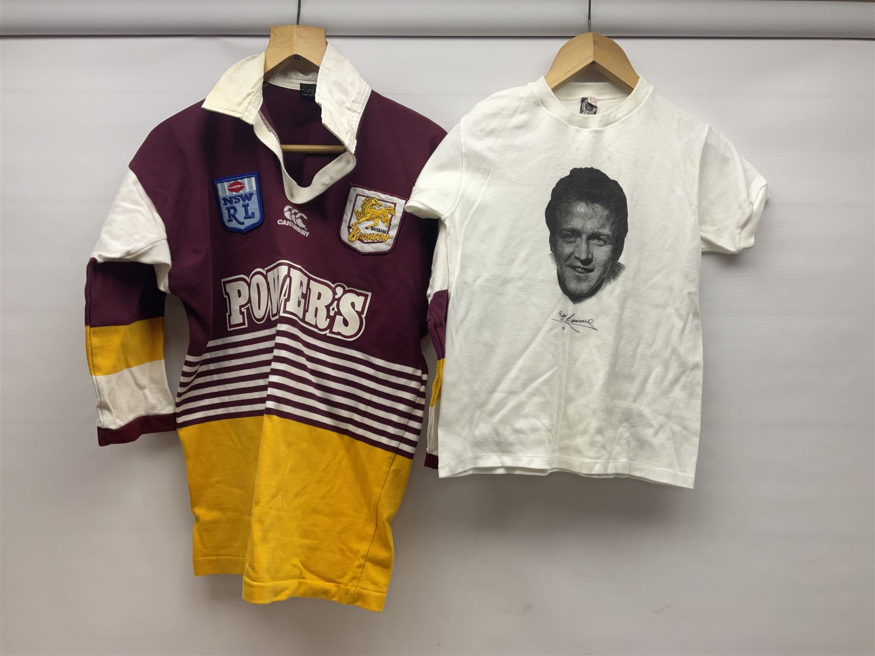 Collection of Leeds United scarves, hats and t-shirts, together with a Washington Redskins NFL sweatshirt and an Australian rugby league shirt