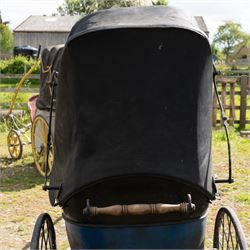 Victorian Bath Chair / Invalid Carriage Converted for Horse Drawn Use

A Victorian bath chair or invalid carriage, later converted for horse drawn use, with black painted bodywork, blue side panels, folding black leather hood and upholstered single passenger seat. The carriage is fitted with large rear wire spoked wheels, smaller front steering wheels, long shafts, footwell and curved body sides, consistent with a late nineteenth century invalid carriage or bath chair form adapted for pony or light horse use.

Features

Bath chair or invalid carriage form
Later converted for horse drawn use
Folding black leather hood
Single upholstered passenger seat
Deep footwell
Black painted body with blue side panels
Large rear wire spoked wheels
Smaller front steering wheels
Long shafts
Lightweight carriage frame

Dimensions:
Overall length: 380 cm
Body length: 204 cm
Width: 88 cm
Height: 178 cm

Wheel Diameters:
Front wheels: 47 cm
Rear wheels: 88 cm

Seating:
Driver: 1
Passenger: None