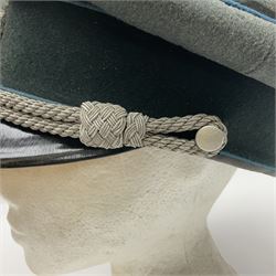 WW2 German Infantry Officer's visor cap with cloth insignia; labelled and stamped Offizier Kleiderkasse Berlin and Erel Stirnschutz